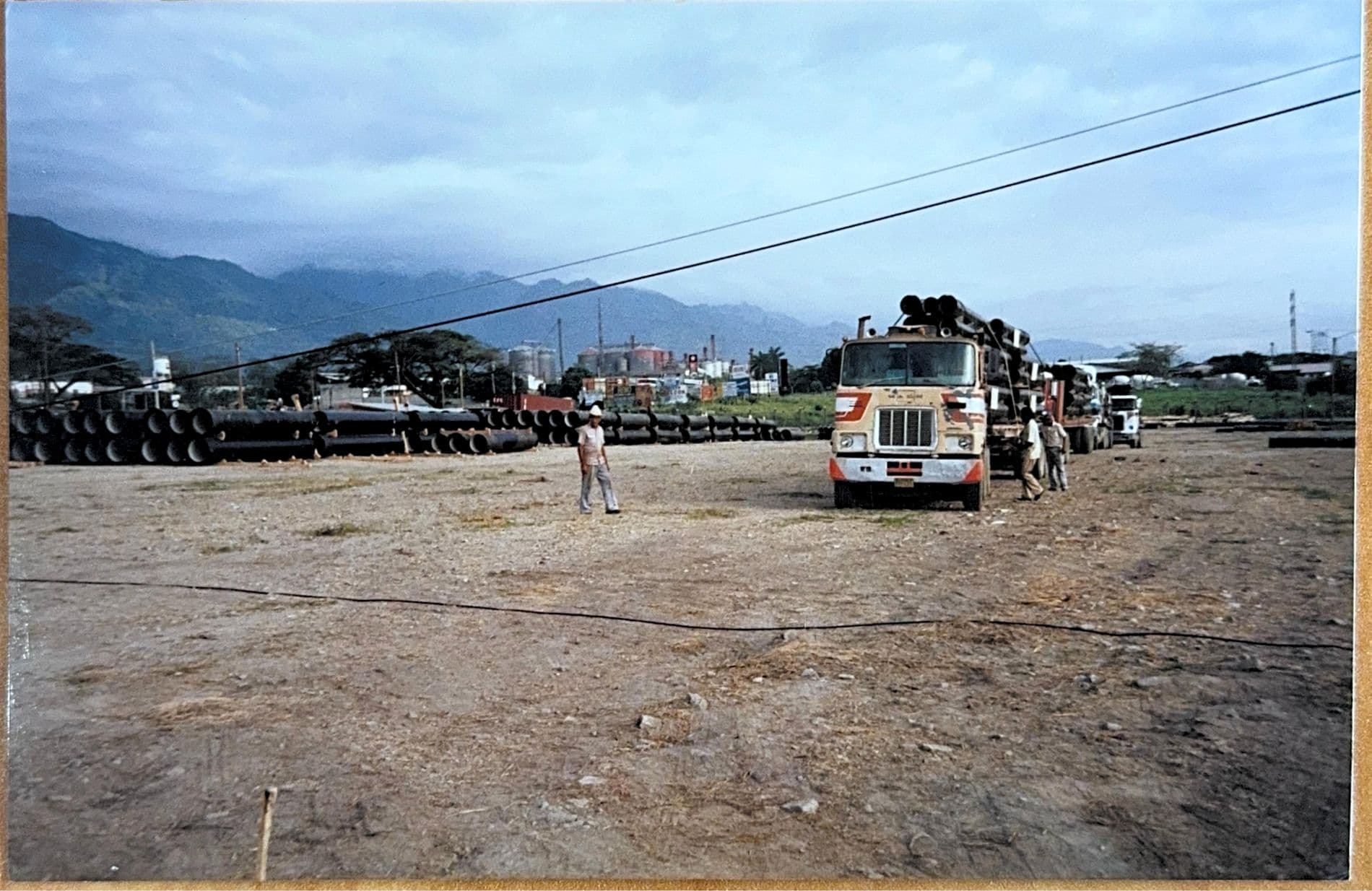 Pipe yard staging against mountains